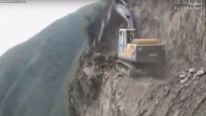 Crazy Excavator Working Edge Of Cliff