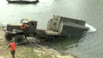 This Badass Off-road Truck "KrAz-255" Launches a Fantastic Portative Bridge On The Water. MUST See!