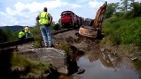 Unique Footage: Locomotive Rescues a Stuck Excavator Smoothly