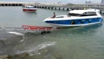 One Tractor to Rule Them All: Cool Tractor Gets Five Huge Boats on Land