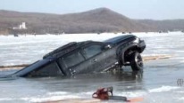 This is How It's Done: Brilliant Guys Pull Huge Vehicle Out of Ice-Cold Water in Less Than 10 Minutes