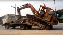 How to Load a Big Excavator On a Small Truck Like a BOSS - Thailand STYLE