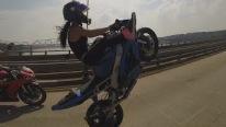 INSANE Stunt - Beautiful GIRL Riding Wheelies On A Long Highway