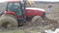 Tractor Gets Stuck In the Mud and Rescues Itself Splendidly