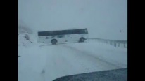 4-Wheel Drive Bus Slides Down the Road with Nearly 1000 Feet Beside It