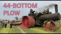 150 CASE Road Locomotive pulling 44 bottom John Deere plow